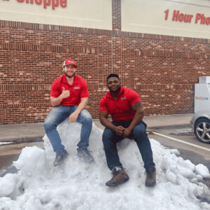 Junk removal crew hauling storm debris and damaged household items after a winter freeze in Collin County, Texas