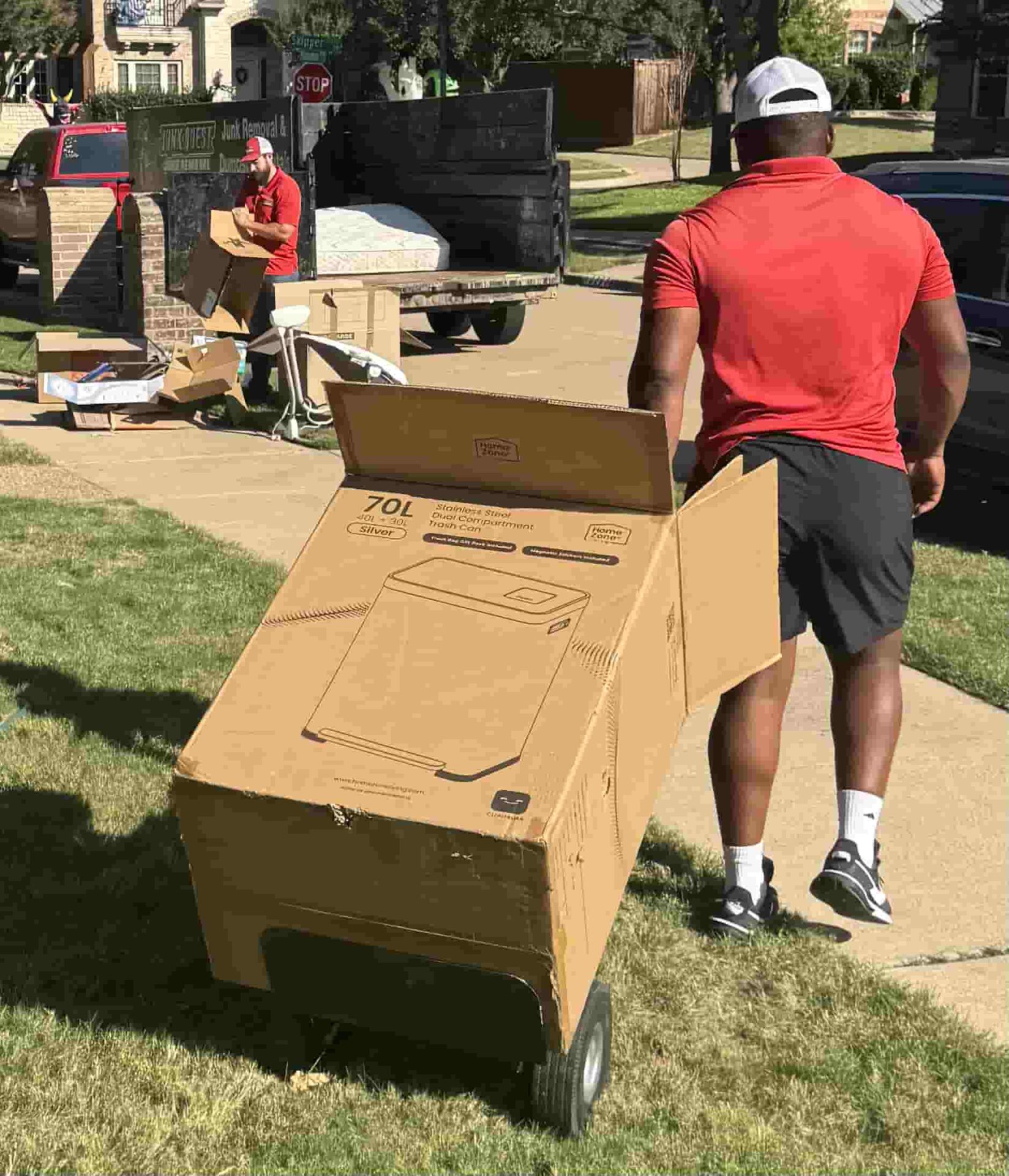 Junk Quest team handling curbside pickup and cardboard removal in McKinney, TX — fast and eco-friendly junk removal service for local homeowners.