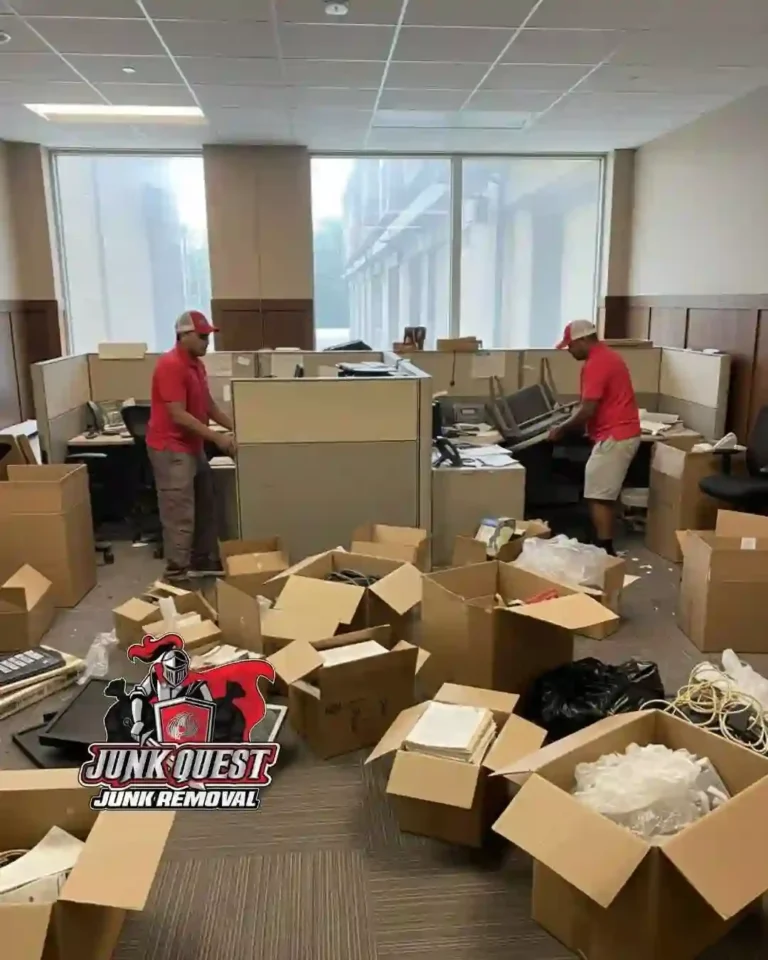 Cluttered office in Plano, TX filled with desks, chairs, boxes, and office items before Junk Quest performed a commercial office cleanout