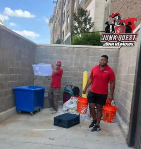 Before commercial cleanout in McKinney, TX with office waste and containers awaiting removal.