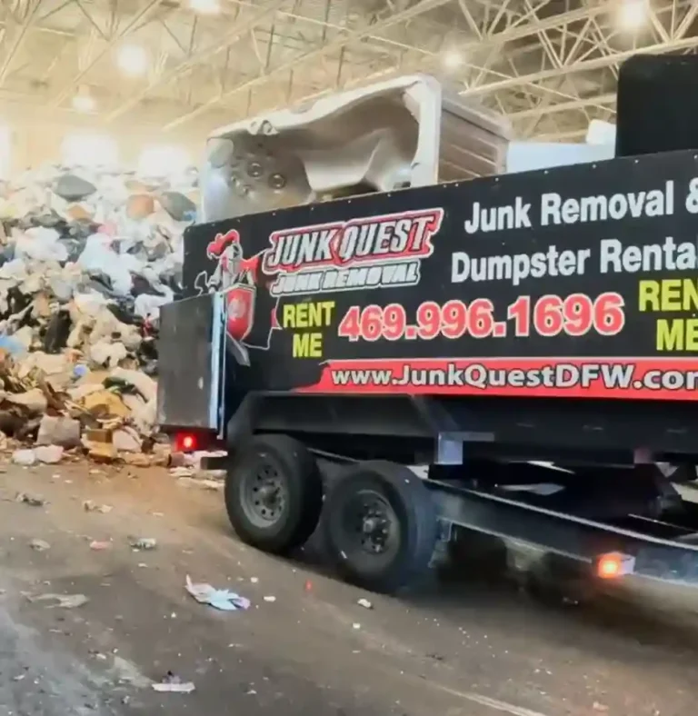 Junk Quest team removing an old hot tub from a residential backyard.
