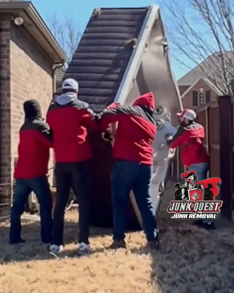 Junk Quest team sliding a hot tub in one piece during a professional removal job