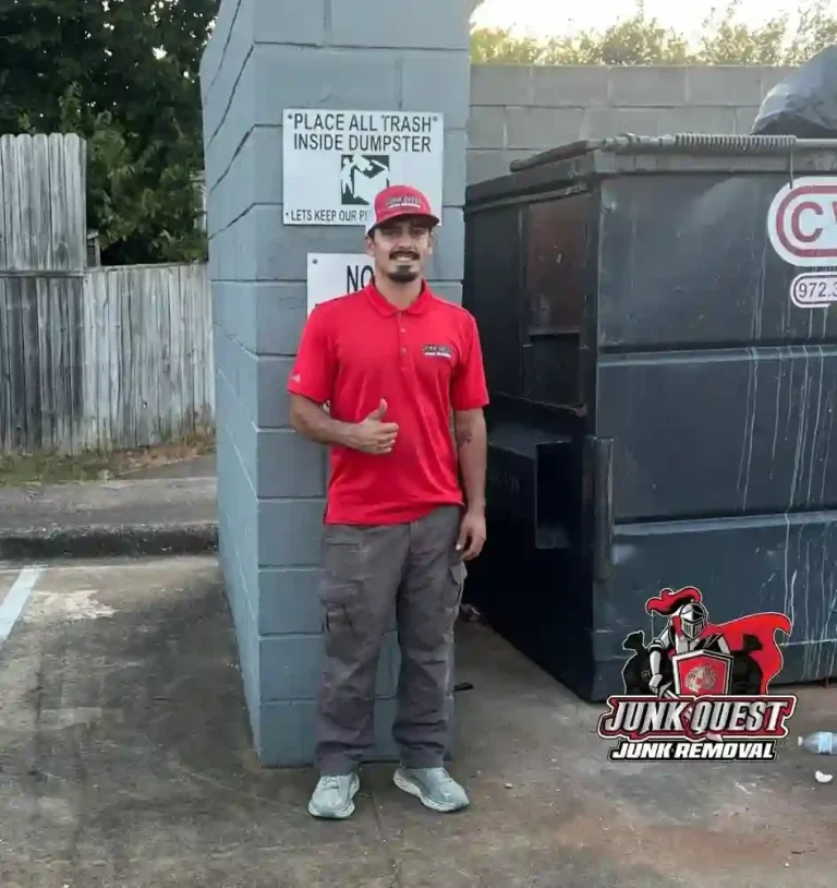 Junk Quest crew member standing in front of a 20-yard dumpster after a junk removal job in McKinney, TX