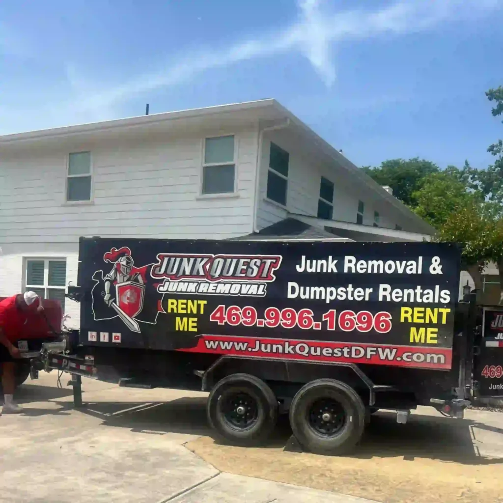 Junk Quest truck and trailer parked outside a home during a full house cleanout service in McKinney, TX.