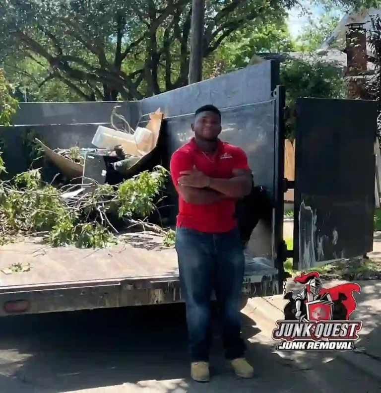 Junk Quest team member standing by the trailer after completing a yard debris removal job in McKinney, Texas