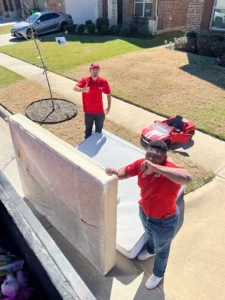 Junk Quest Removal team recycling old mattresses during residential pickup in North Dallas
