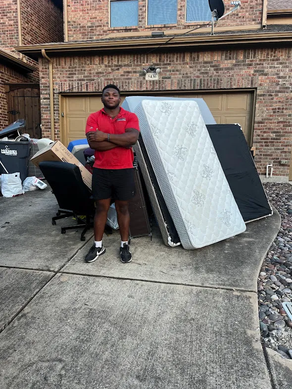 Junk Quest Removal team handling mattress disposal and bulky furniture in North Dallas