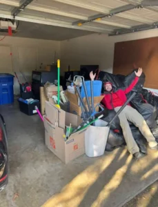 Garage filled with storm debris and damaged household items after severe weather in McKinney, Texas