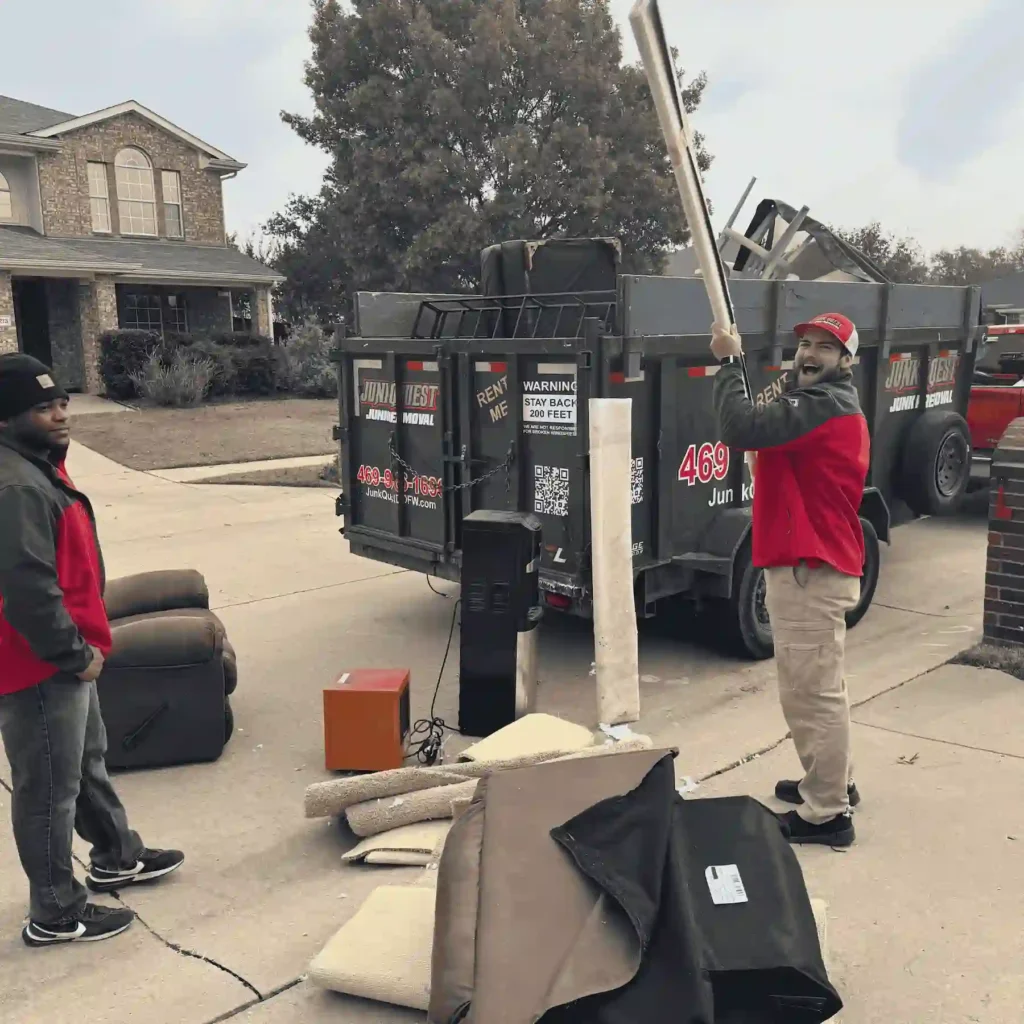 Storm debris cleanup in McKinney with fallen branches and damaged outdoor items being hauled away after a storm