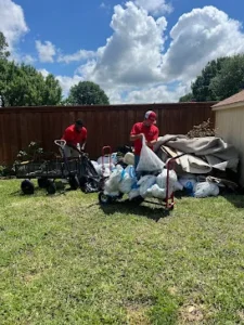 Junk Quest Removal team handling office furniture and debris during professional office junk removal service in North Dallas