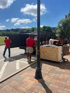 Junk Quest Removal crew hauling bulky metal items during scrap metal pickup near me service in North Dallas