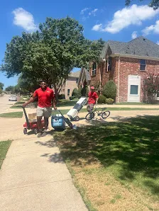 Junk Quest Removal crew transporting equipment and items during residential junk removal service in North Dallas