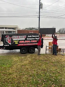 Junk Quest Removal crew loading debris during professional hoarding cleanup service in North Dallas