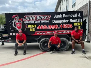 Junk Quest Removal crew sitting in front of branded trailer in North Dallas