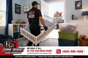 Junk removal crew hauling outgrown kids furniture from a bedroom before back to school in Frisco Texas