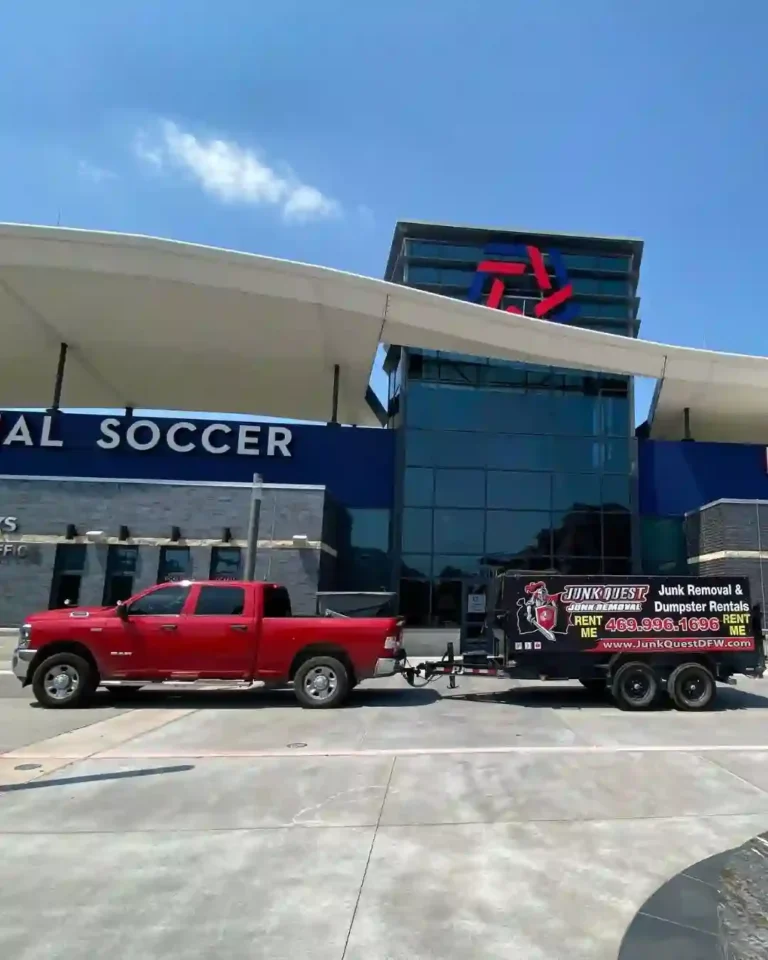 Junk Quest truck and trailer during a commercial cleanout completed in The Colony, TX.