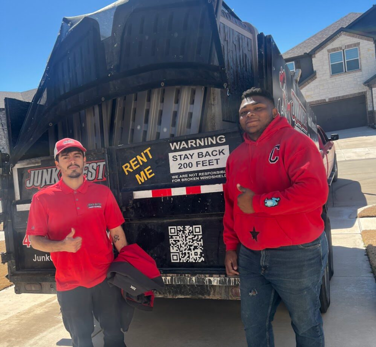 Junk Quest crew member and customer giving a thumbs-up after a job