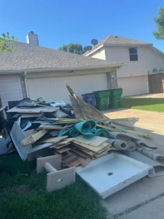 Old television ready for removal by Junk Quest in North Dallas.