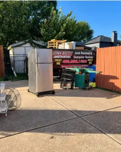 Junk Quest appliance removal for landlords with refrigerator and household items at a North Dallas rental property