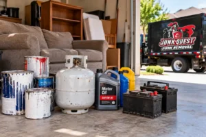 Items junk haulers won't take in Frisco, TX, including paint cans, a propane tank, and motor oil