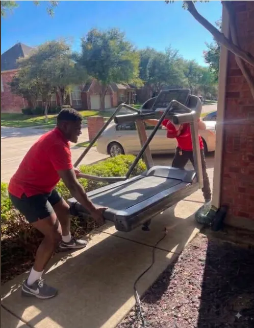 Junk Quest crew removing an old treadmill from a North Dallas home for responsible disposal