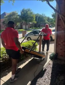 Junk Quest crew removing a treadmill from a North Dallas home for exercise equipment removal